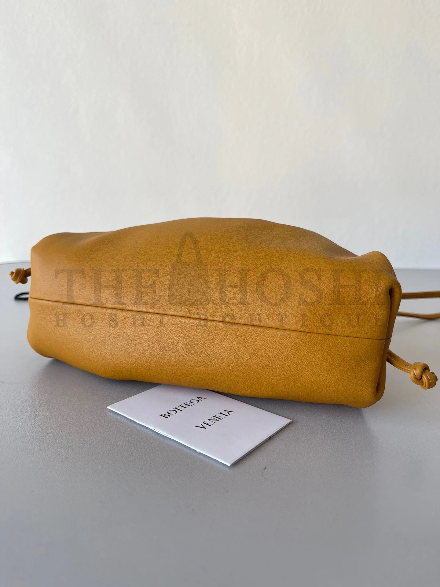 B0tt*ga Ven*ta Mini Pouch with Strap in Teak Calfskin Master Quality