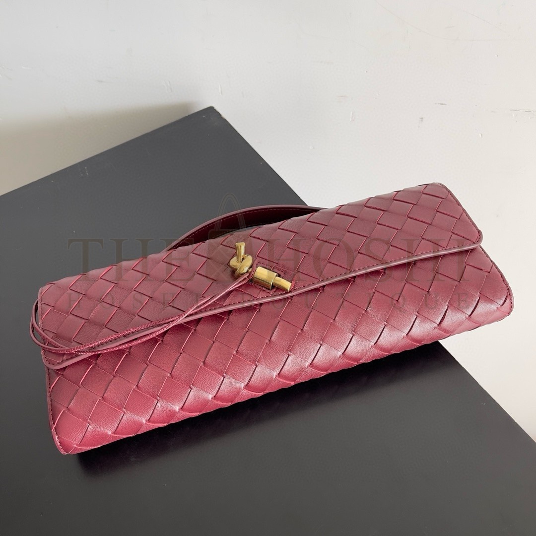 B0tt*ga Ven*ta Andiamo Clutch with Handle in Barolo Intrecciato Lambskin Master Quality